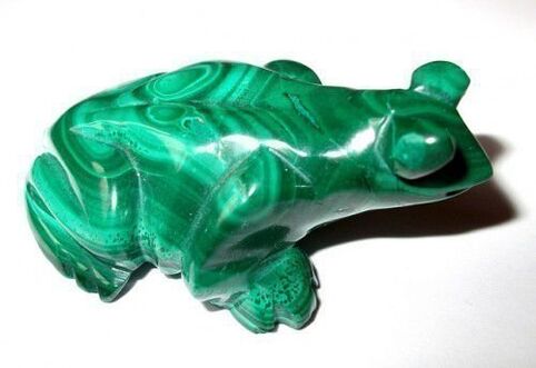 green malachite frog in the form of a lucky amulet